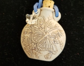 Butterfly raku potion bottle necklace