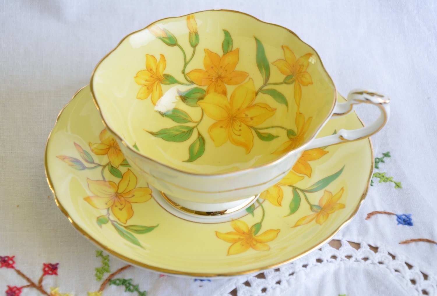 Paragon yellow tea cup and saucer double warrant yellow