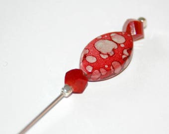 Fibula red marbled bead and glass beads