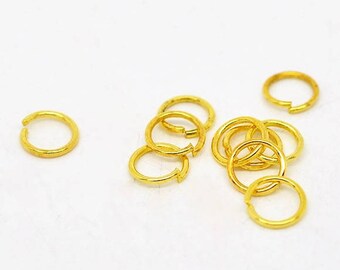 100 jumprings in 6 x 0.7 mm round, golden color