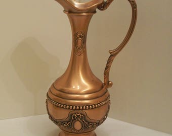 copper jug pouring style with handle