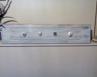 Coat rack, coat hook.