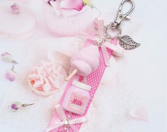 gioiello di borsa tratta rosa in fimo