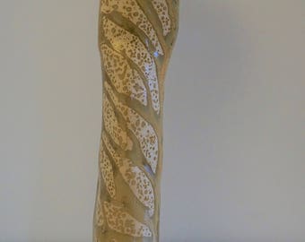 Golden ceramic art vessel with dotted glaze