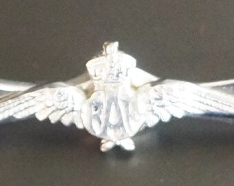 A 20th Century RAF Wings & Propeller Brooch With Chrome Finish.