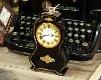 Vintage Russian mechanical clock Agat from Soviet Union era table clock