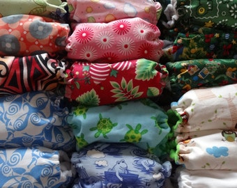 Handmade Pocket Cloth Nappy Value Packs - Will fit newborn till age three - Each nappy comes with a free bamboo cotton insert!