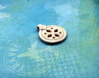 The Traveller Carved Bone Charm