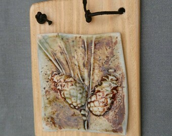Handmade ceramic textured botanical hanging plaque./gift.