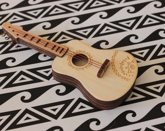 Ukulele - Miniature - present