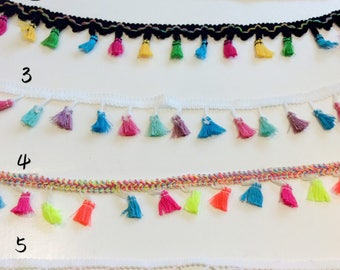 Bright and colourful fabric trimmings in 5 designs. Sold Per Metre