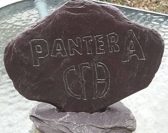 One of engraved Pantera logo