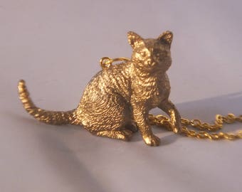 cattykins gold necklace statement