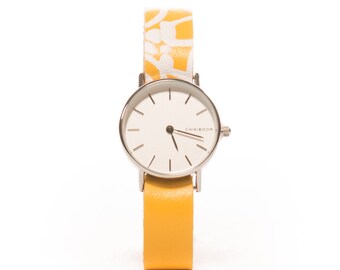 Woman shows yellow screen printed - minimum yellow women's watch