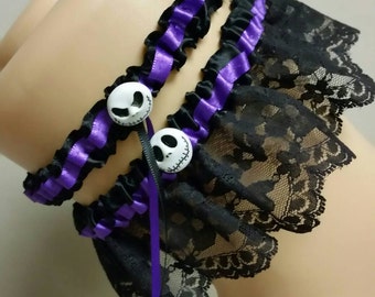 Nightmare Keepsake and Toss Garter Set - black and purple polyester satin blend, soft black lace and a pair of cute Jack Skellington charm!