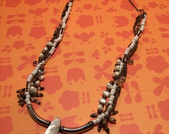 Very stylish boho beaded necklace with shell pendant