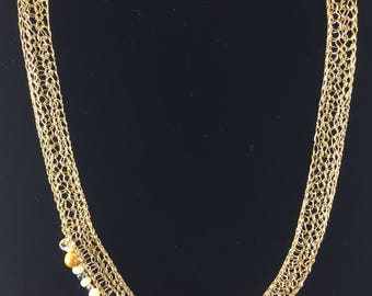 crocheted with wire , pearl necklace