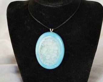 Oval blue sky melted glass pendant