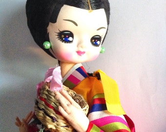 SALE 24.00 Vintage Japanese pose doll on wood stand big eye Geisha