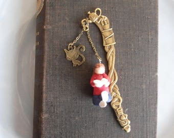 Metal with reading and cat bookmarks