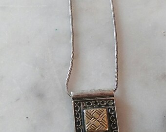 14 Karat Gold and Sterling Silver Small Pendant Necklace