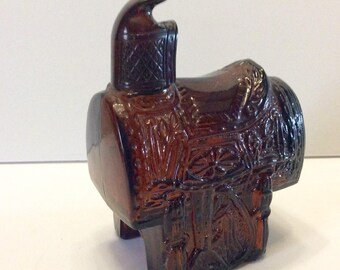 Avon after shave bottle saddle shape. Empty excellent. Free ship to US