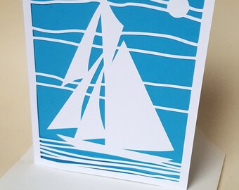 La carte "Le bateau" bleu et blanc avec son enveloppe