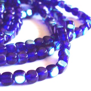 Czech glass x 100, Cobalt AB, 4mm cube, pressed beads