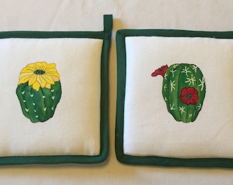 Pair of pot holders with application of hand painted cactus