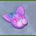 Lilac, sculpted cat head bead.
