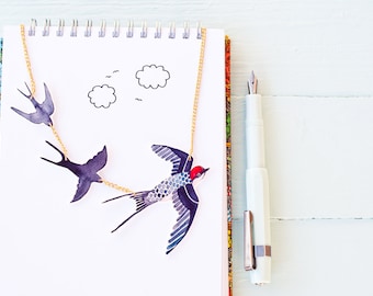 Flying swallows statement necklace