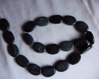 Beads, 20x14mm Black and Green Jasper Flat Ovals with Design. Sold per 16 inch strand. There are 20 beads on the strand.