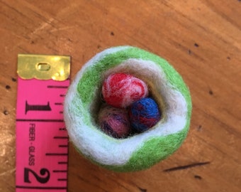 Colourful needle felted nest and eggs