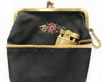 Mid Century tapestry change purse or cigarette holder with lighter. Arrow purse lighter.