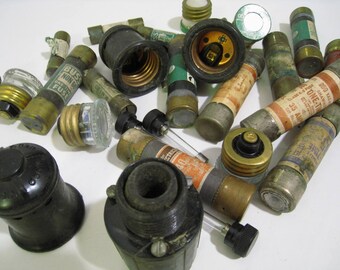 30 piece lot of electrical bits. fuses, bulbs, outlets, more. Great for crafts, mixed media, assemblage. Found objects. buss, tron, etc