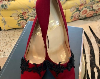 Christian Louboutin red silk pumps