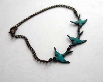 Three Patina teal blue bird charm antiquie bronze bracelet7.5inches