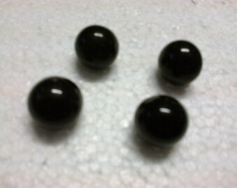 Four 15mm diameter black balls
