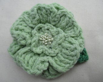 Crocheted flower corsage brooch