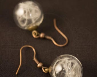 Glass globe and feather earrings with white ostrich