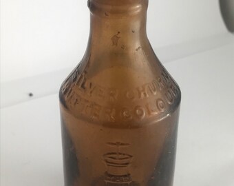 A Pictorial brown Victorian bottle