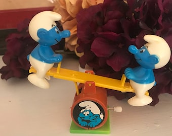 Vintage see saw smurf wind up toy. Peyo.