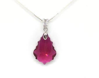Gorgeous Swarovski baroque Ruby crystal. Sterling silver chain.