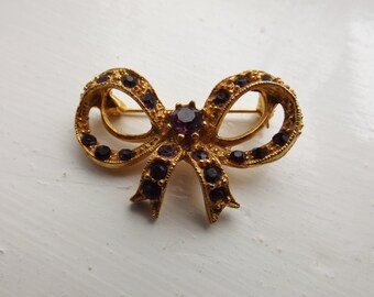 Gold Bow Brooch with Purple Diamonte Stones - SALE