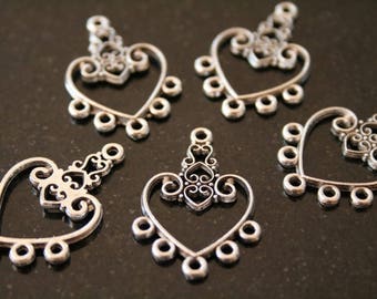 16 antique silver connectors. (ref:1024).