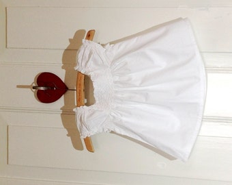 A sweet smocked blouse in white