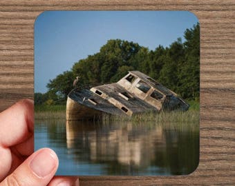 4 photos of a ship wreck coasters
