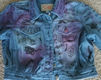 Upcycled graffiti denim jean jacket