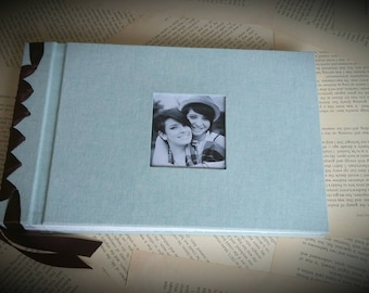 Personalised handmade, self mount, ribbon bound photo album