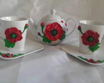 Teapot and packed coffee or tea